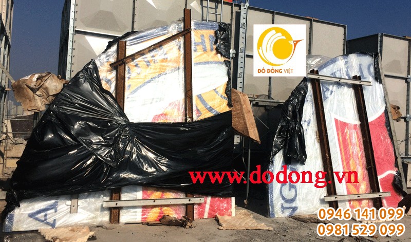 Cầu logo đồng nặng 3 tấn lên lóc tòa nhà kiểm toán