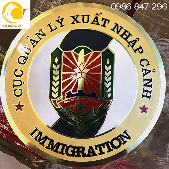 logo xuất nhập canh bằng đồng dk 3,2m dập nổi